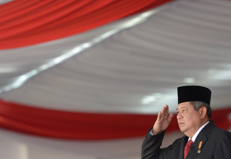 SBY. Mantan Presiden Susilo Bambang Yudhoyono saat memberi hormat di acara peringatan hari kemerdekaan Indonesia ke 69 di Istana Negara, 17 Agustus 2014. AFP PHOTO / ADEK BERRY